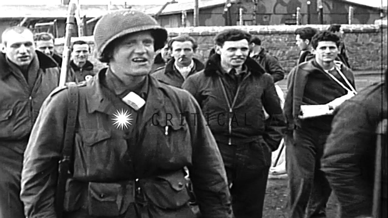 Freed US and Allied prisoners of war leave camp and smile and wave at Dulag-Luft ...HD Stock Footage
