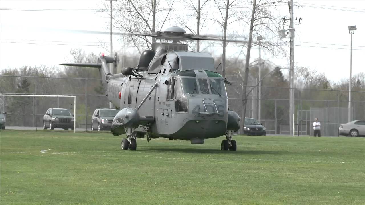 Cool Sea King Helicopter lifts off in soccer field