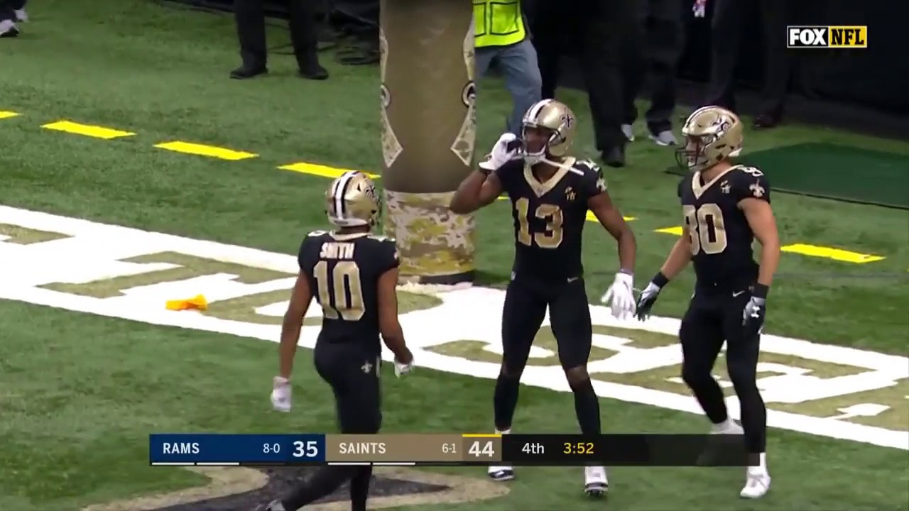 Michael Thomas makes a call after scoring a TD