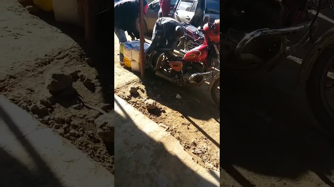 overloaded motorbike broke down