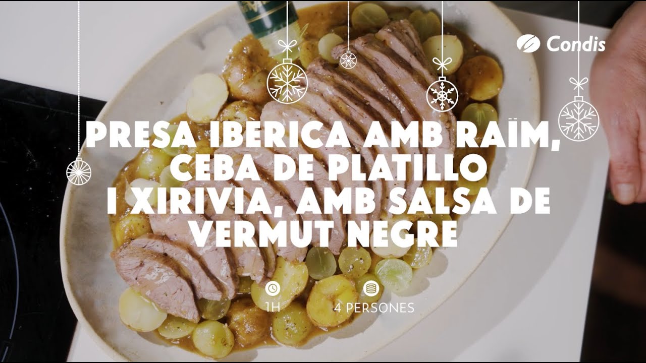 Presa ibèrica amb raïm, ceba de platillo i xirivia, amb salsa de vermut negre