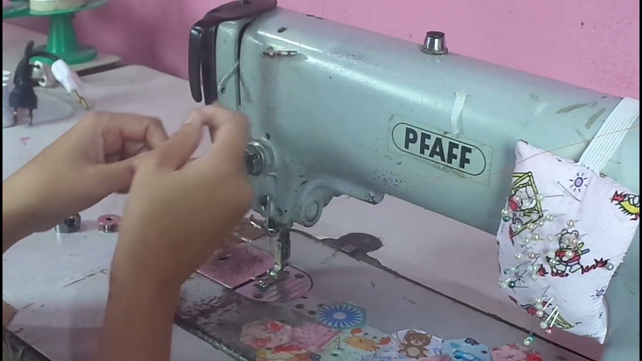 Como colocar linha na máquina PFAFF
