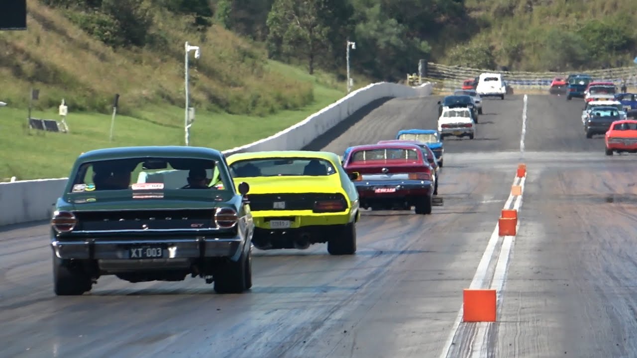 Tuff cars gun it exit show from drag stip @ Sydney Dragway Oldskool Muscle Car Cruises event