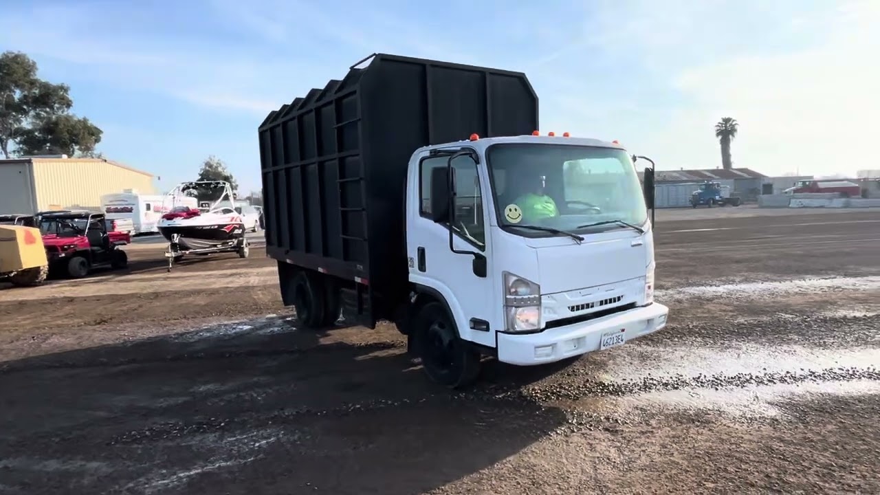 2016 Isuzu S/A Chip Truck