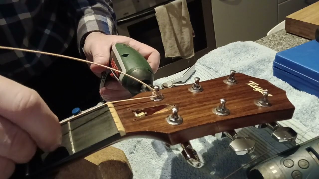 Taylor 314SE Acoustic guitar string height adjustment with truss rod adjustment Part2