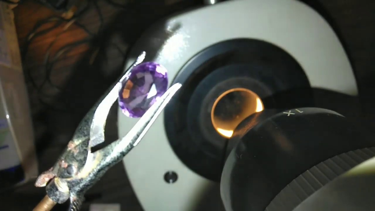 Learn gemology in class and do microscope test on stone