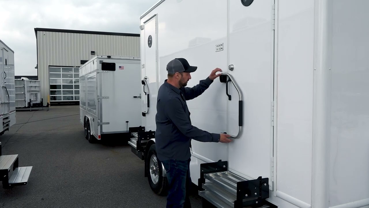 Deploying Handrails on 6' Wide Satellite Suite Restroom Trailer | Satellite Industries