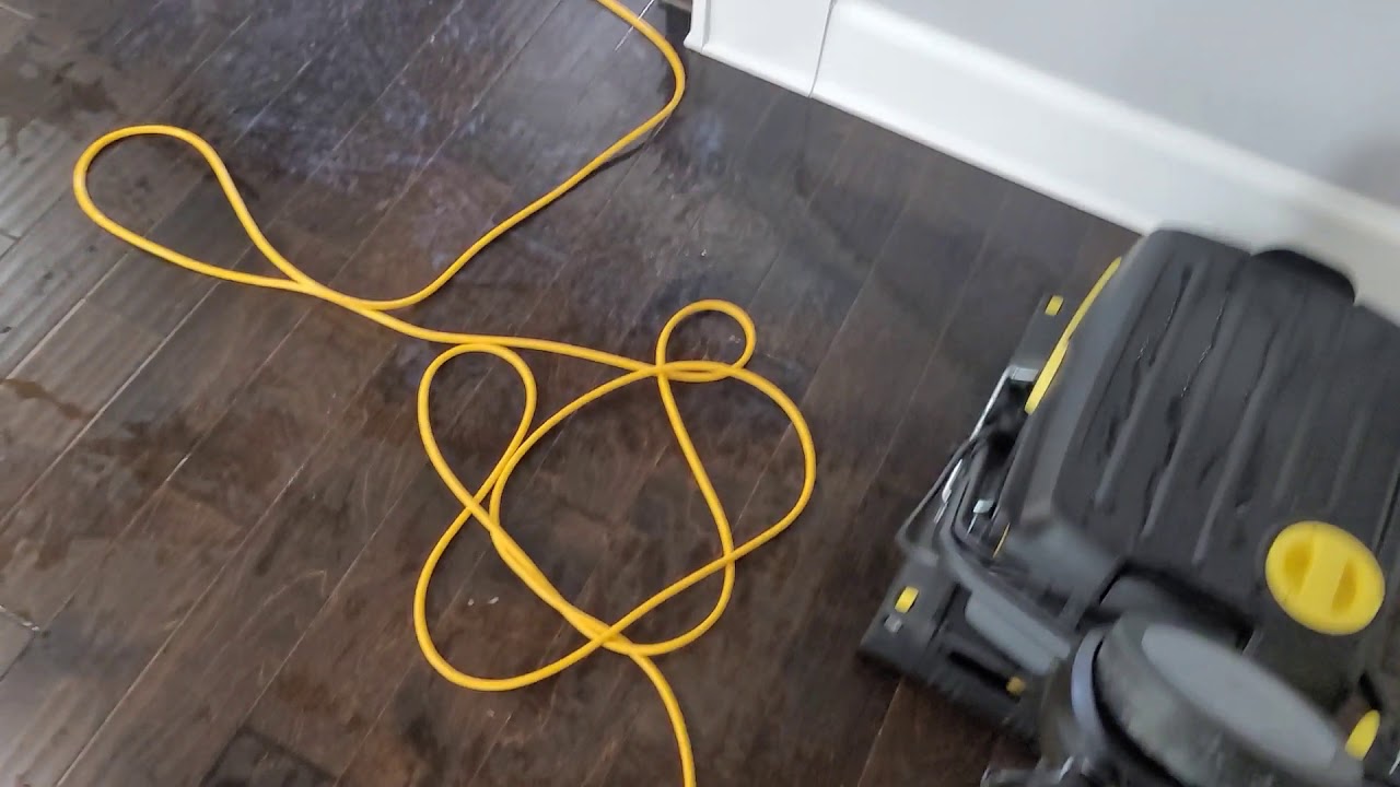 Removing heavy wax build-up from engineered hardwood floors in Buford GA
