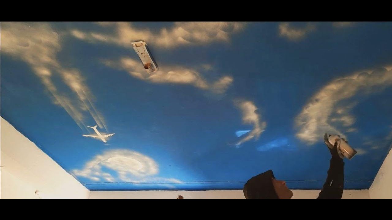 Painting Clouds on a ceiling , 4x6m .