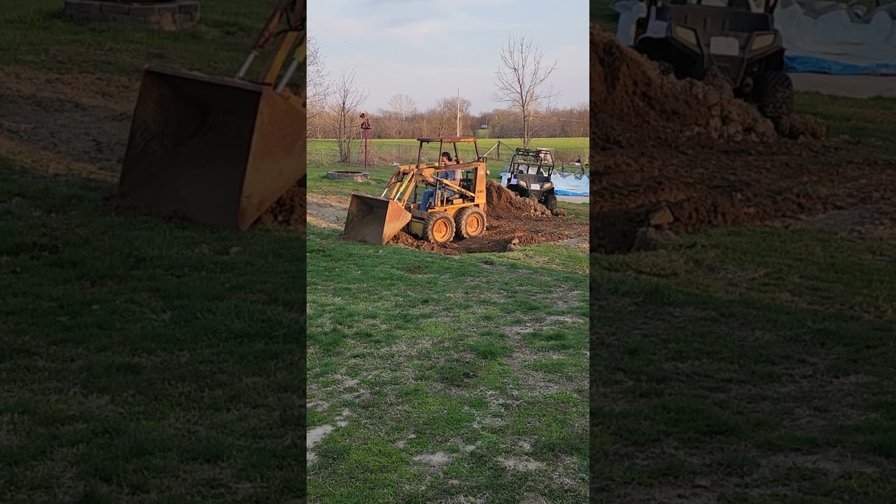 case 1816 skid steer moving dirt