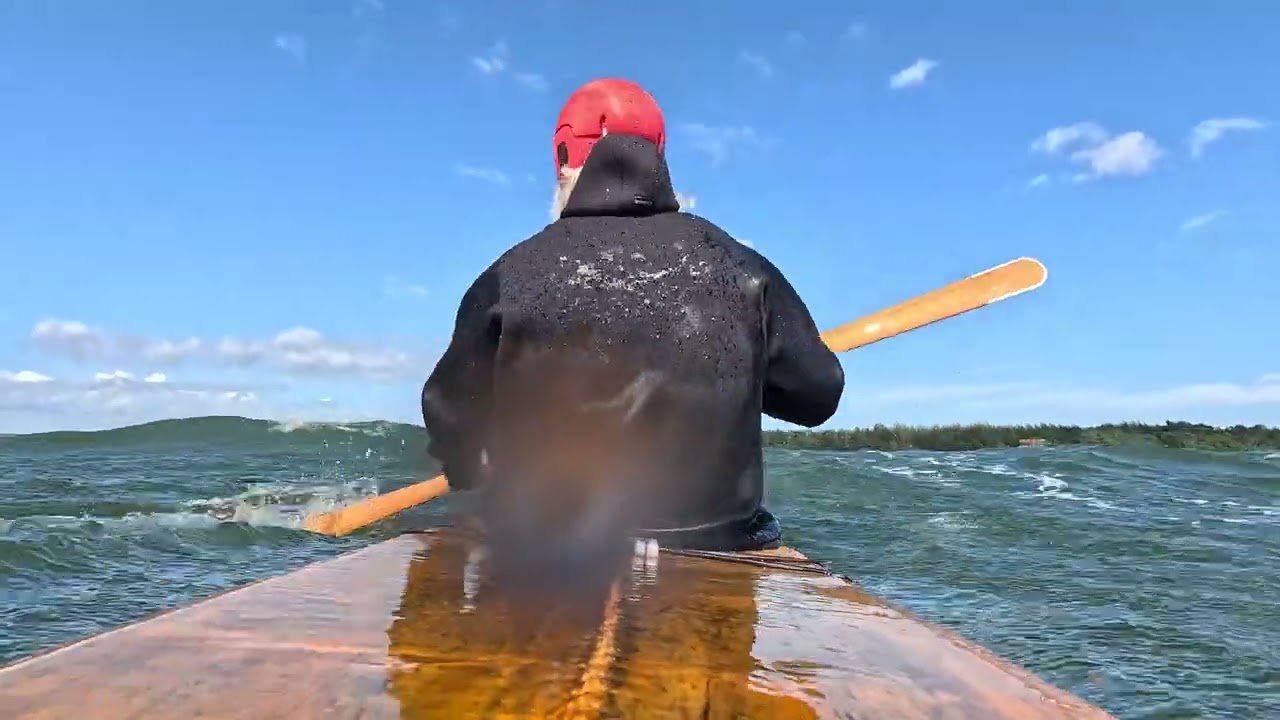 Choppy surf with a Greenland Skin On Frame kayak in the Flaka bay, Åland