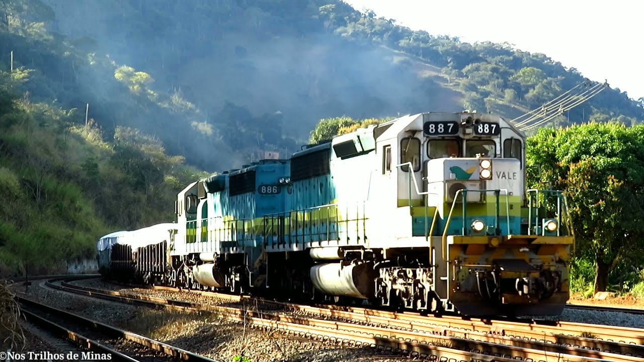 Dupla de Locomotivas GM SD45-2BB liderando trem cargueiro e minério vazio passando por Nova Era-MG