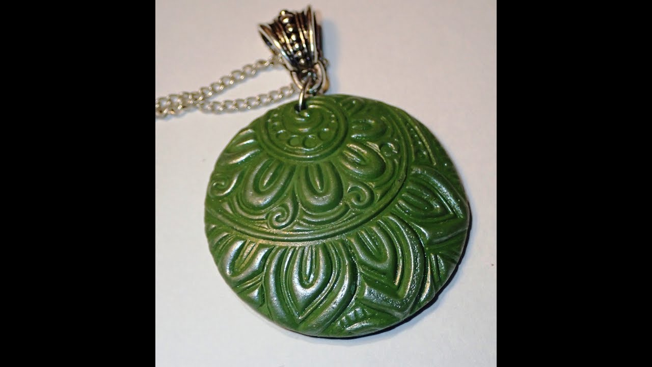 Polymer clay necklace with stamps and embossing folder