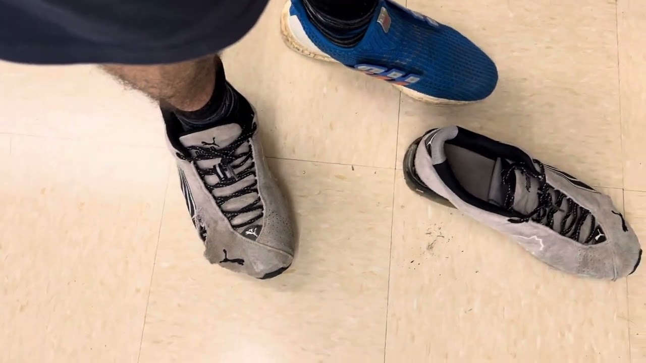 Shopping Wearing Fun Trashed Puma Running Shoes With A Paper Jock Underfoot!