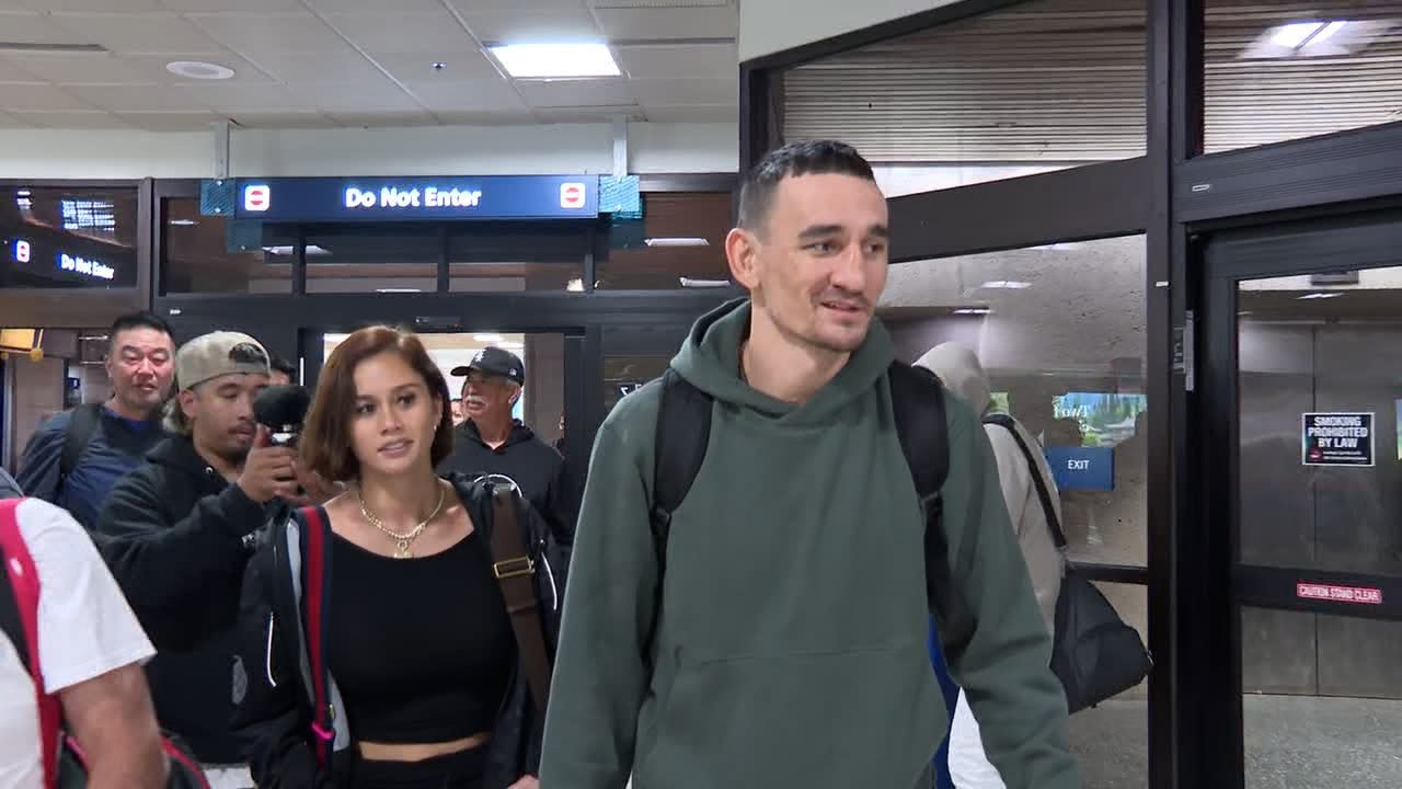 Max Holloway returns home