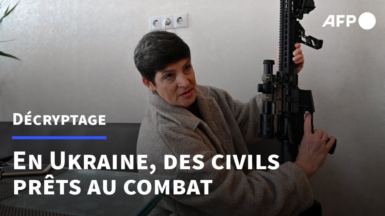 Face &agrave; la menace russe, des Ukrainiens pr&eacute;par&eacute;s et divis&eacute;s | AFP