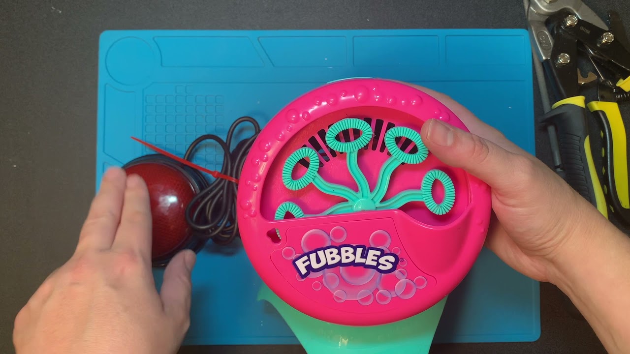 Switch Adapted Bubble Machine With a Battery Interrupter