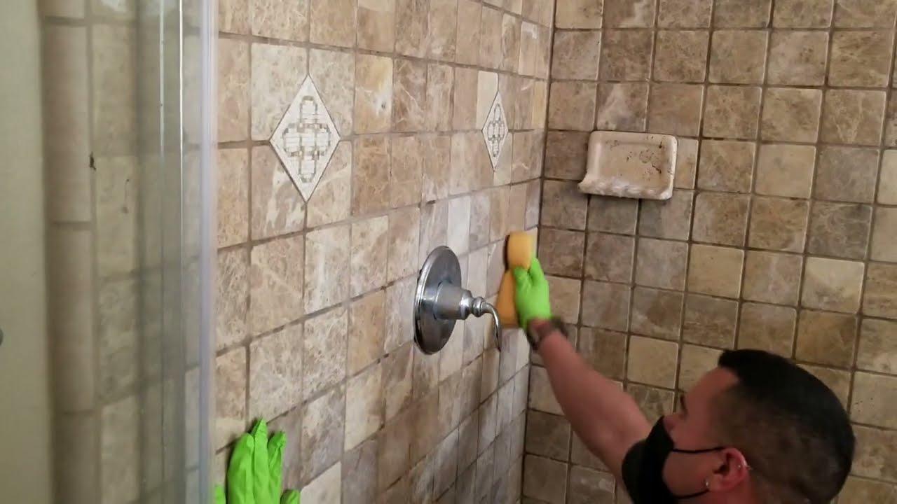 Watch this Moldy Travertine Shower transform using our mold treatment and coating removal services.