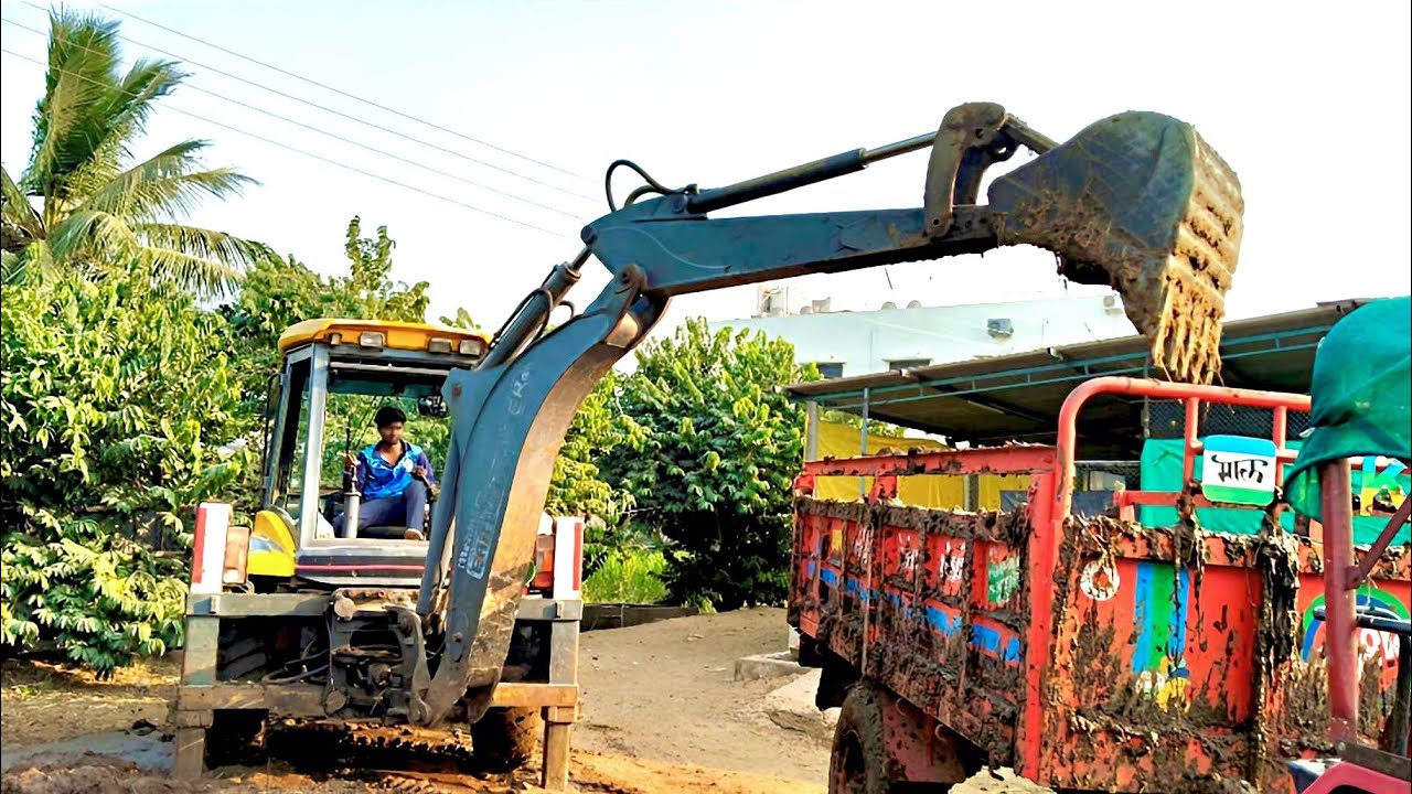 आज गाय का गोबर भरने आये mahindra jcb  vs tractor loding.
