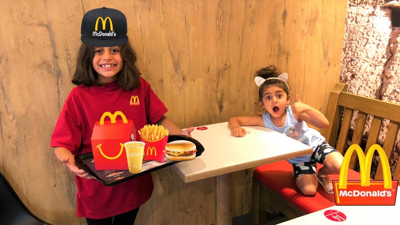 Kids pretend play working at McDonald's with surprise toys part 2