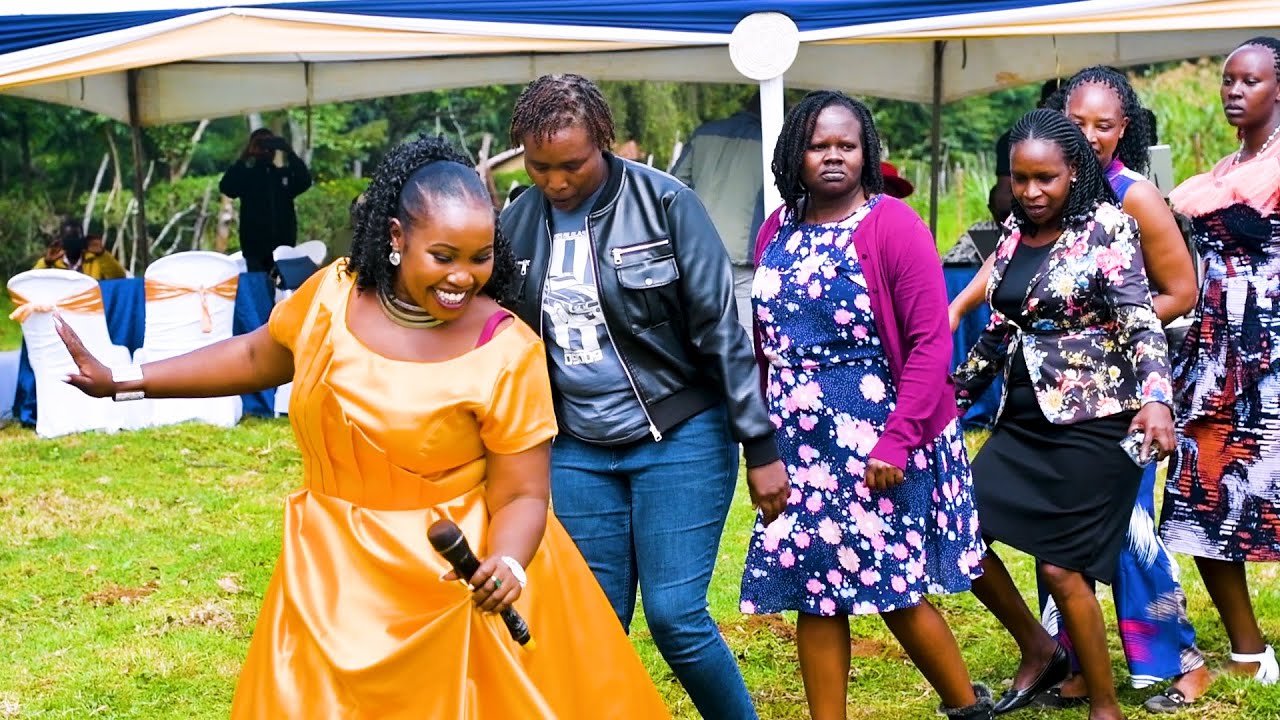 CATHY KOMEN PERFORMS IKARARAN AND CHEBO BABA AT A HOME COMMING CEREMONY IN KESES