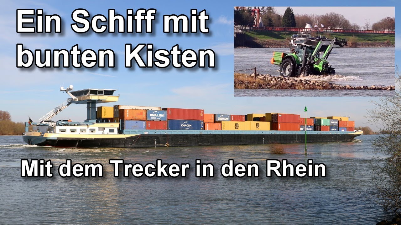 Containerschiff voll bunter Kisten - mit dem Trecker in den Rhein - Binnenschifffahrt - Niederrhein