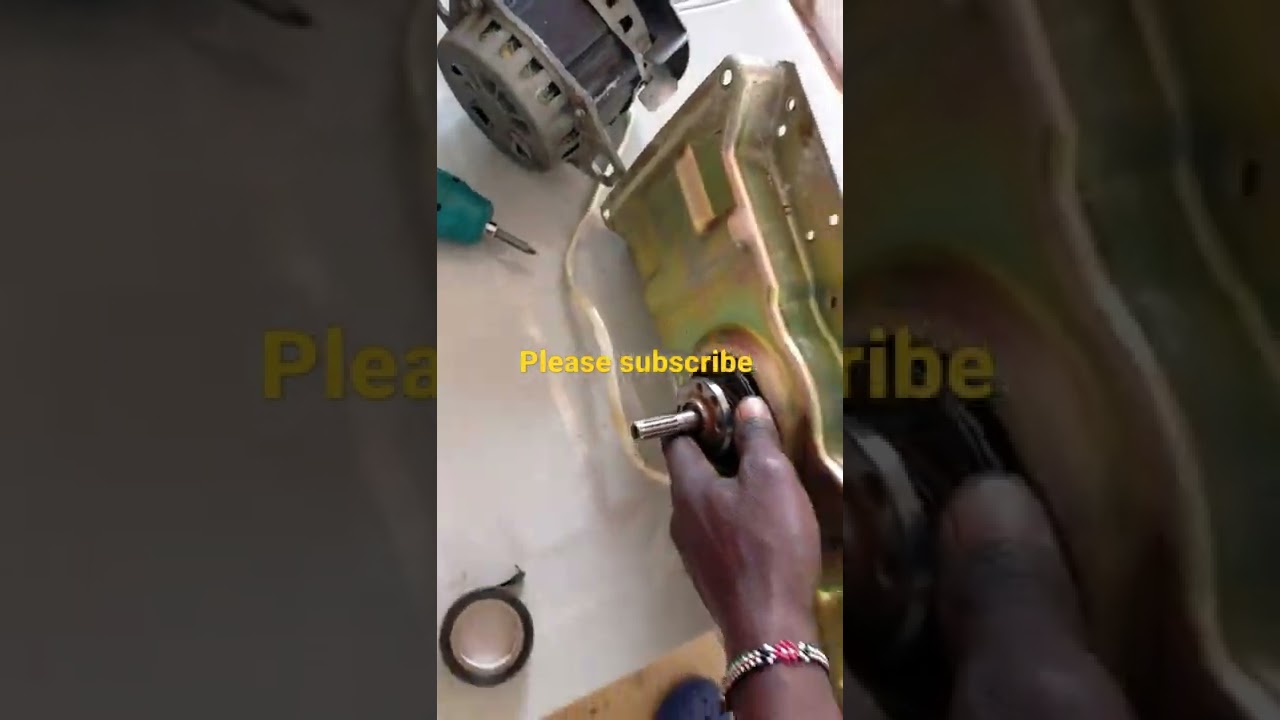 Dissembling an automatic top load washing machine that has a clutch assembly problem