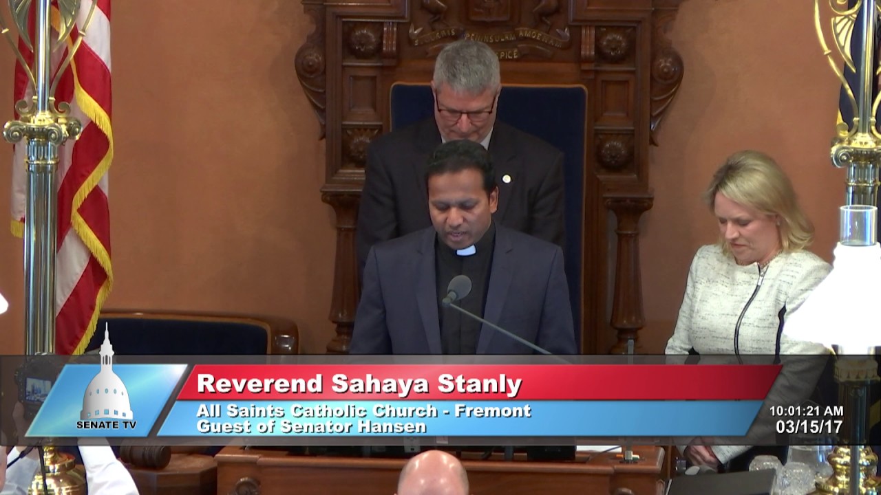 Sen. Hansen welcomes the Rev. Stanly to deliver invocation at the Michigan Senate