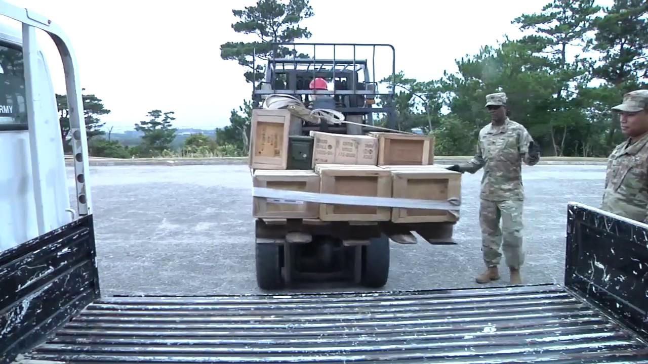 Soldiers with 10th RSG prepare ammunition for training