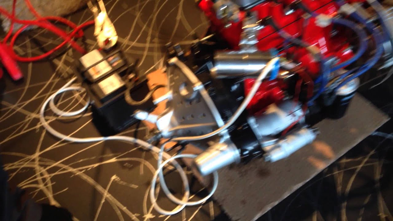 Starting a classic mini engine out of the car.
