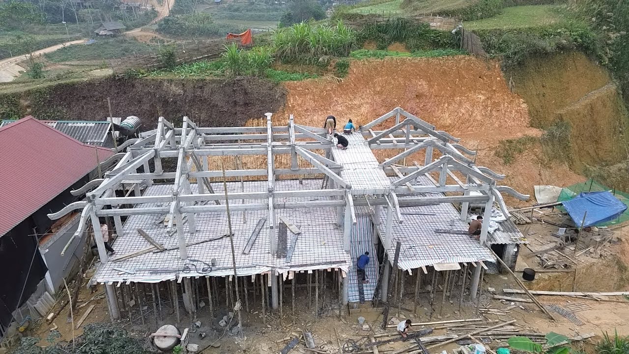 Mẫu nhà sàn bê tông 1 gian 2 trái và bếp cầu thang lên giữa 