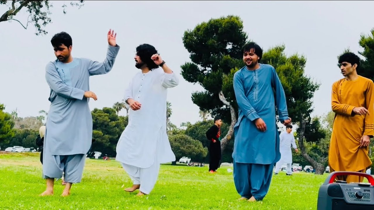 Embrace the vibrant Afghan Attan and savor every moment of your life.