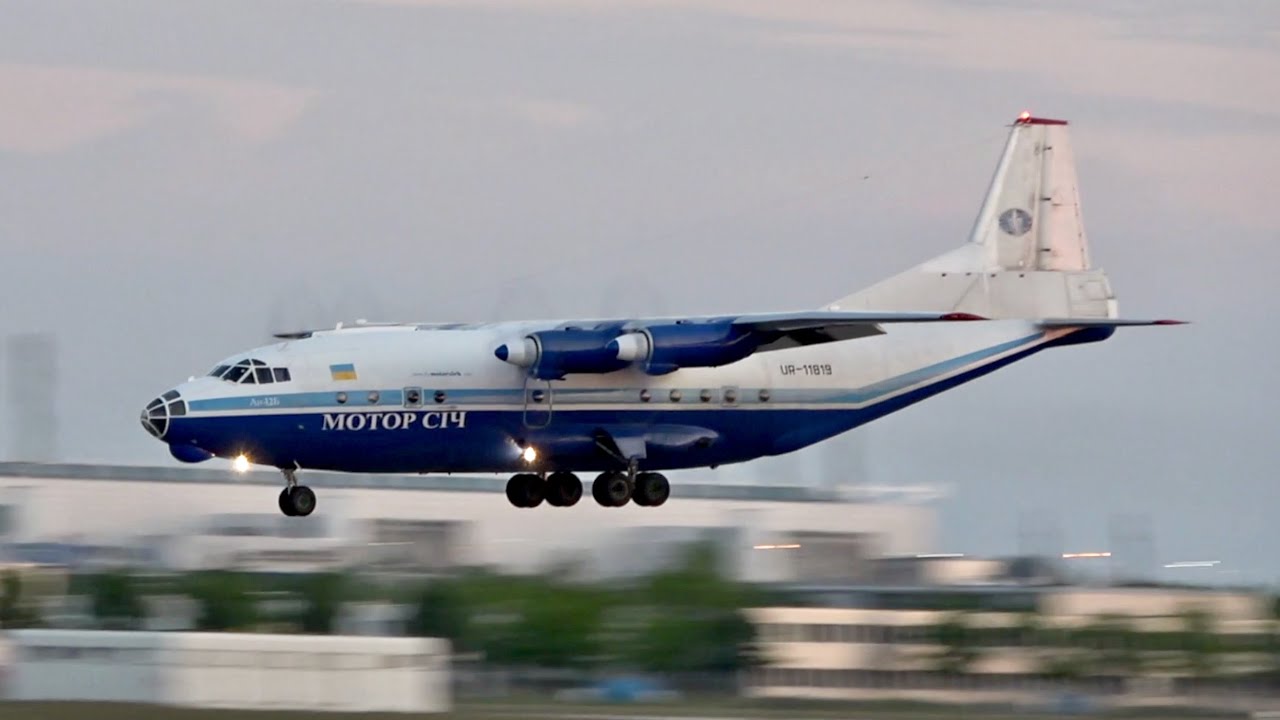 Antonov AN-12B Motor Sich Airlines UR-11819 Sunset arrival at Munich Airport