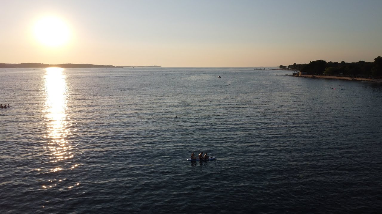 Fishing and standup paddeling - Valbandon beach Croatia