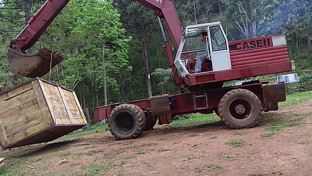 Escavadeira Poclain ly80 4x4 , 14 tons, primeiro dia de trabalho no sitio