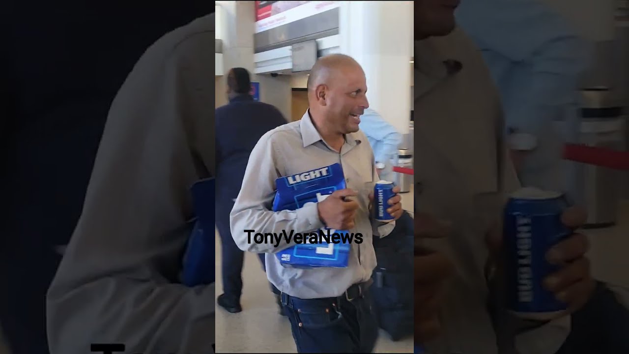 Man walking around LAX airport harassing passengers and employees and drinking in public