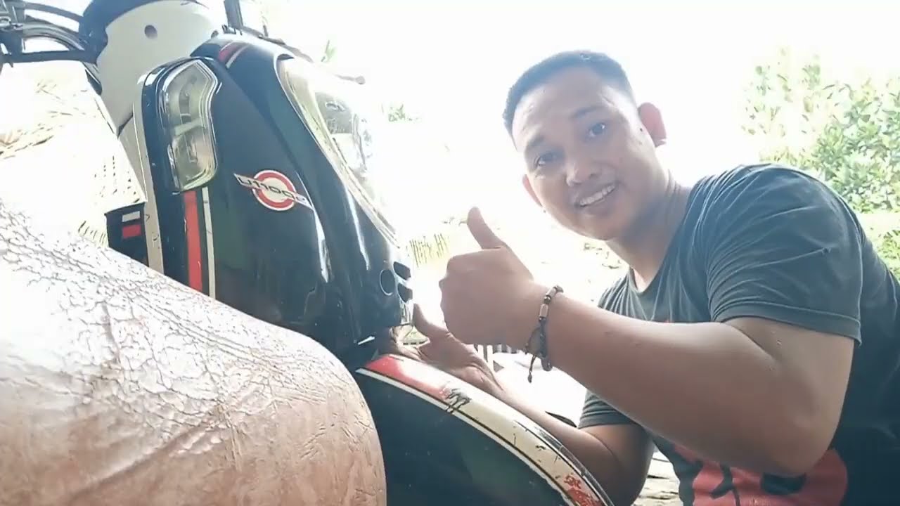 Cara mudah mengantikan bola lampu depan motor scoopy