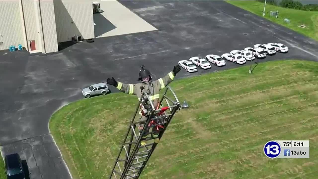 Toledo Fire & Rescue recruits go airborne with 100-foot ladder climb