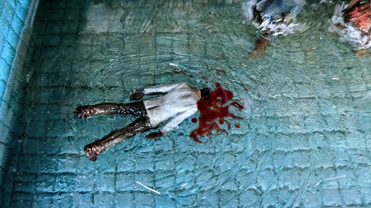 Diorama of Zombie apocalypse at a public swimming pool.