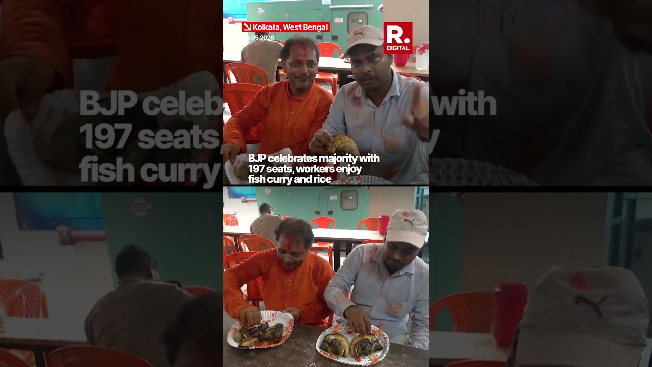 BJP workers celebrate with fish curry & rice as they cross the majority mark with 197 seats