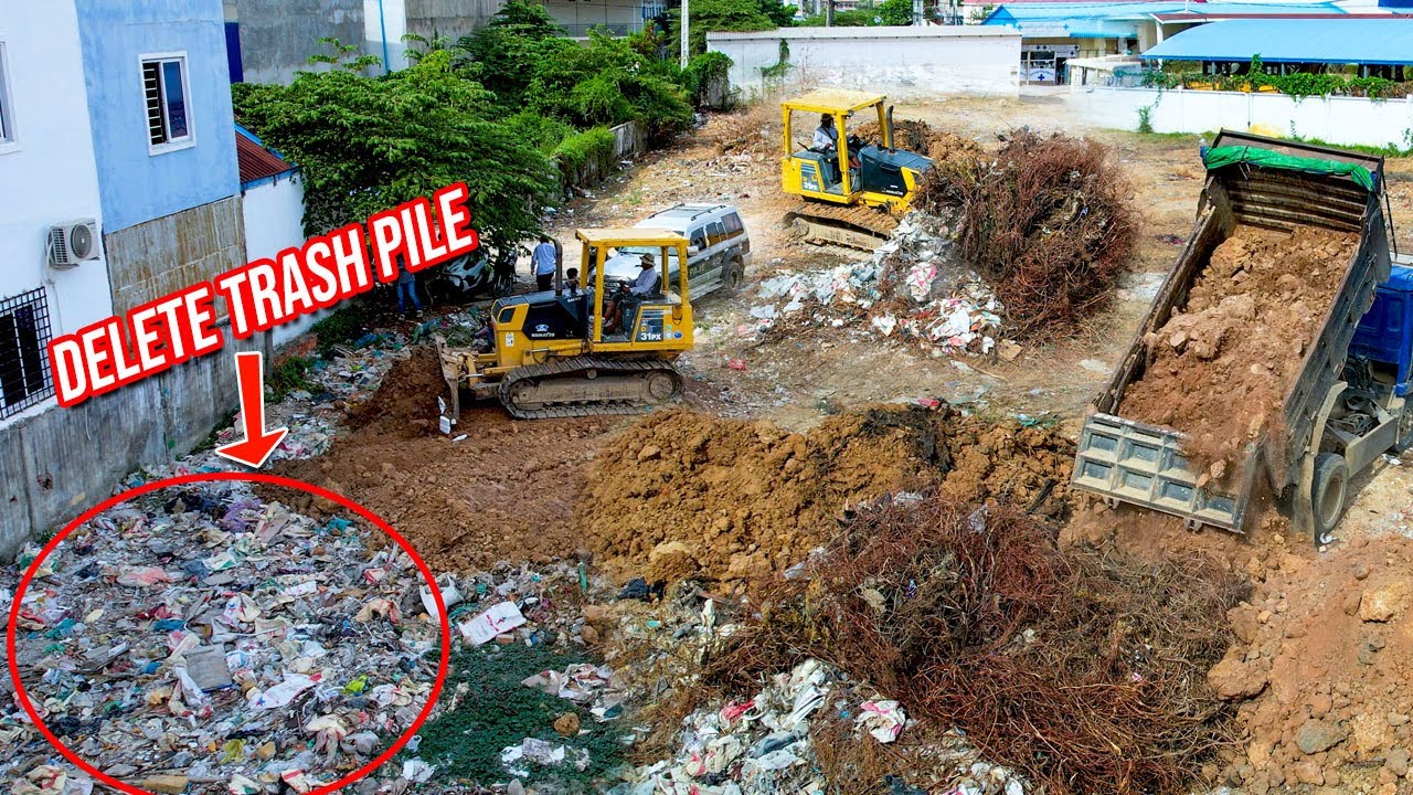 Just Start a New Project Landfilling By Bulldozer Komatsu D31PX Push soil to Delete Trash Pile