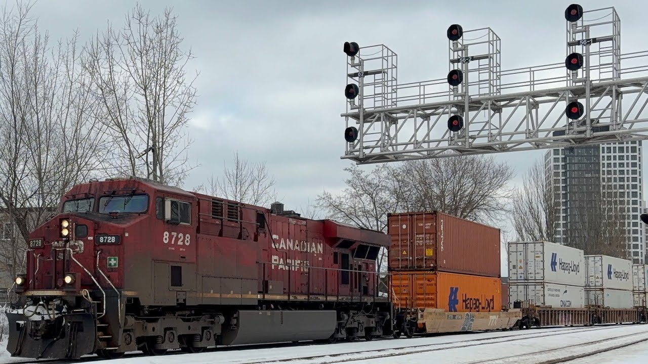 CPKC 113 passing through osler St 