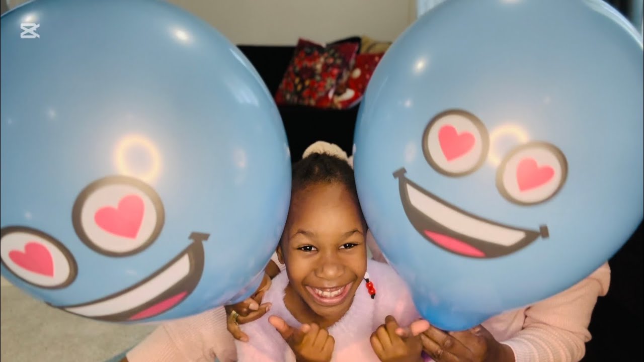 Blowing Emoji Balloons