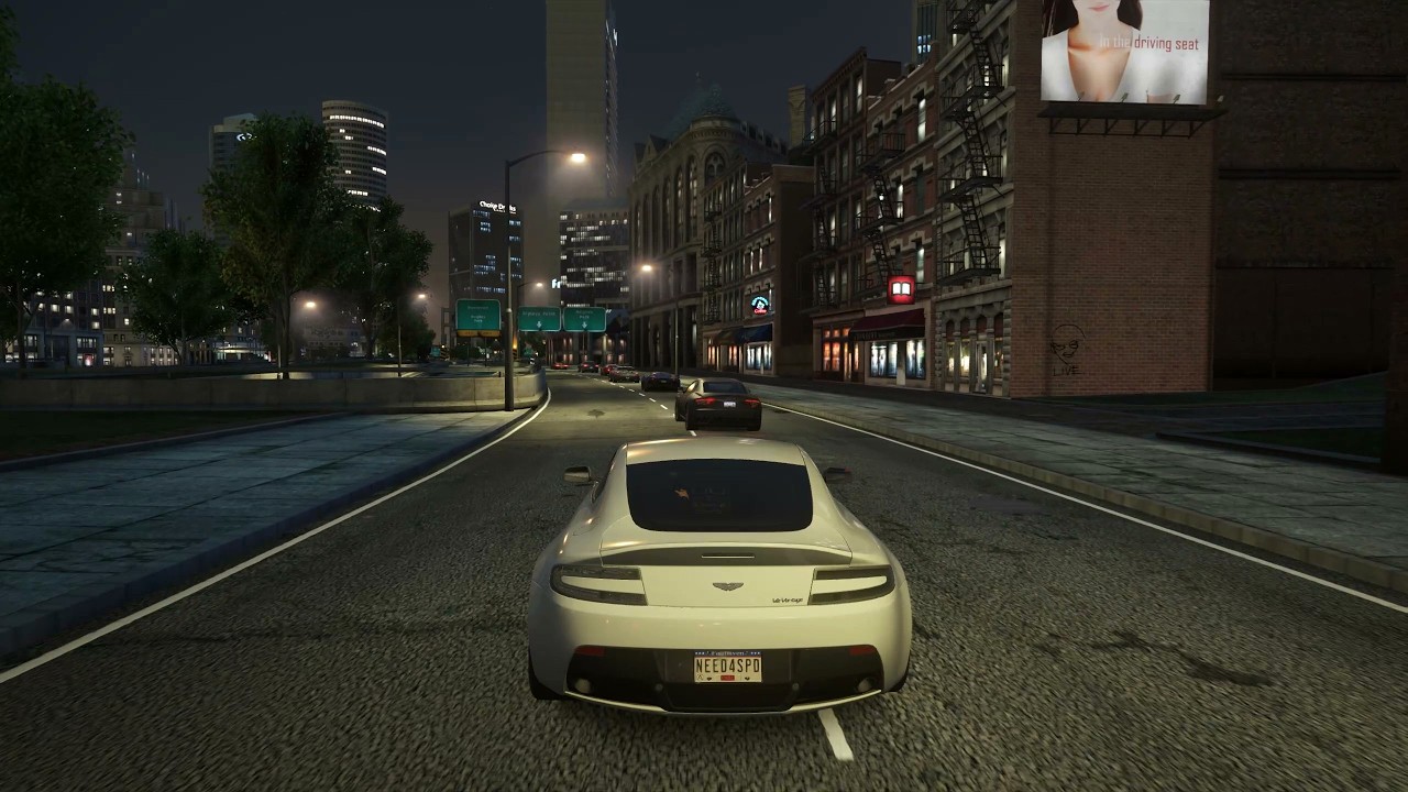 The White Aston Martin V12 Vantage In Fast Speed Racing At Night | Need for Speed™ Most Wanted.