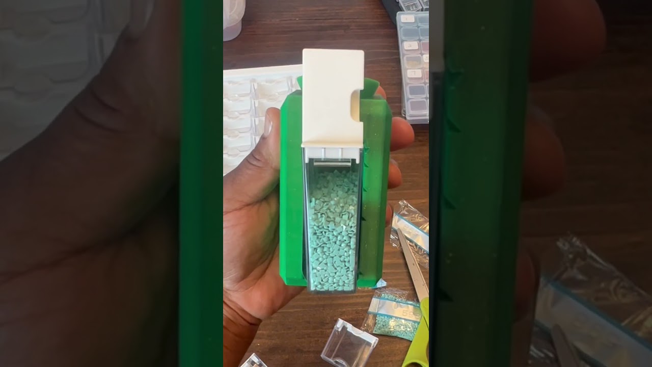 How many large bags of Diamond Art Club drills will a large Elizabeth Ward container hold?
