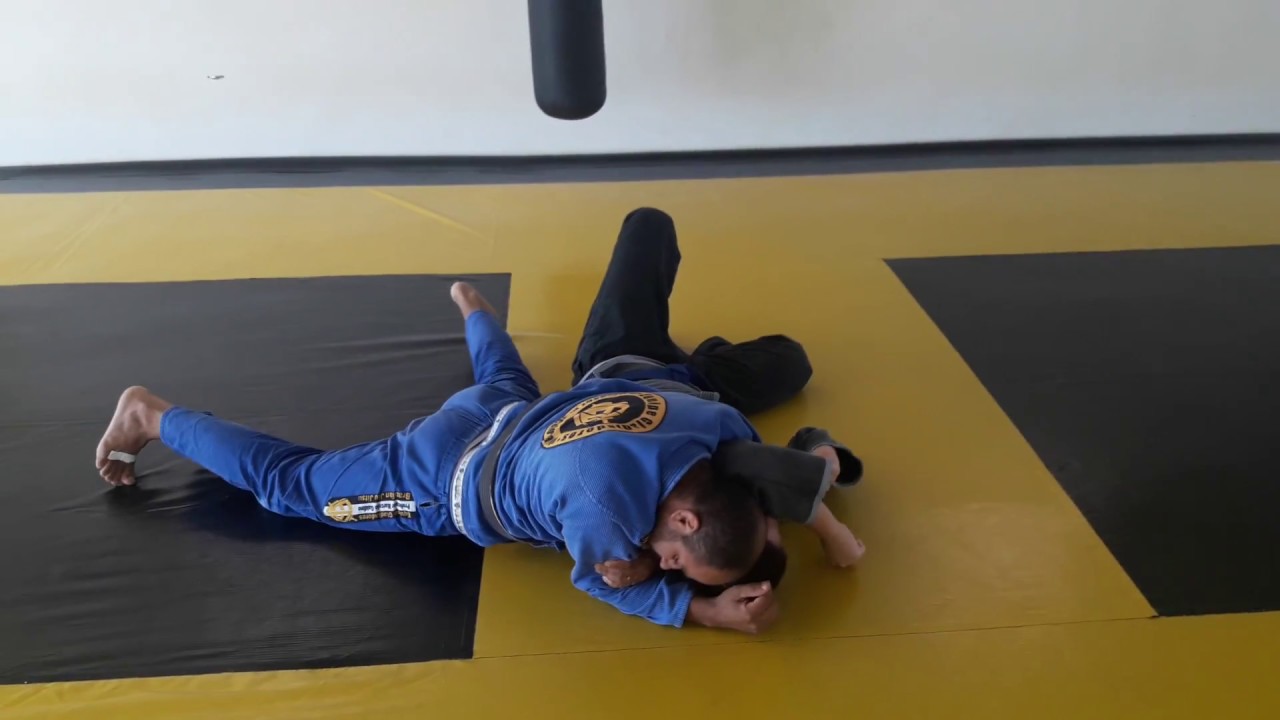 Passagem de meia guarda finalização kata gatame