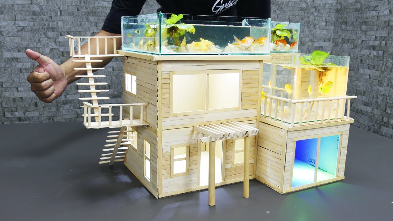 Beautiful aquarium combines with Popsicle Sticks House diy for décor your garden