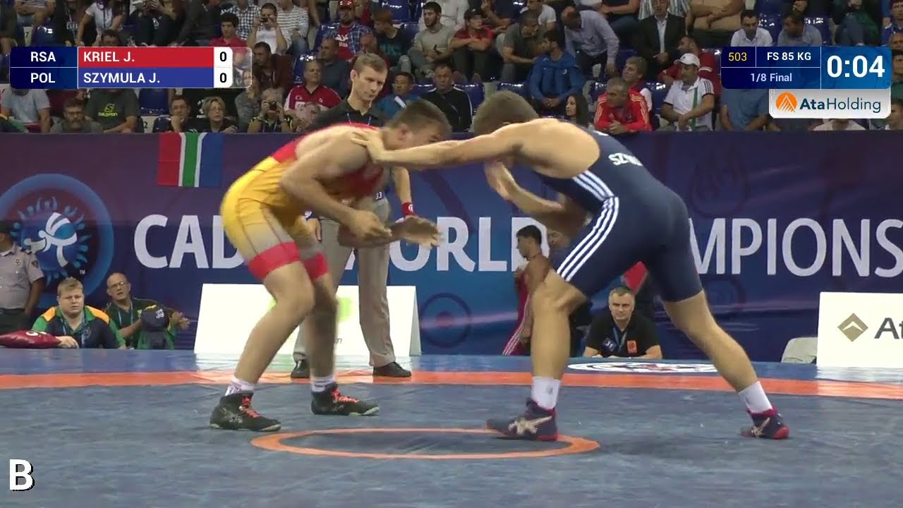1/8 FS - 85 kg: J. SZYMULA (POL) df. J. KRIEL (RSA) by TF, 13-2
