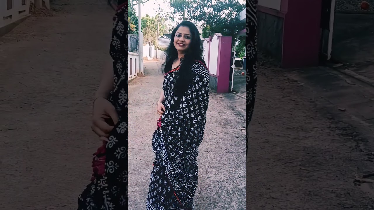 Pom-poms. prints, and pure Mulcotton!Black & White Hand-block Mulcotton Saree with Pom-pom edging.