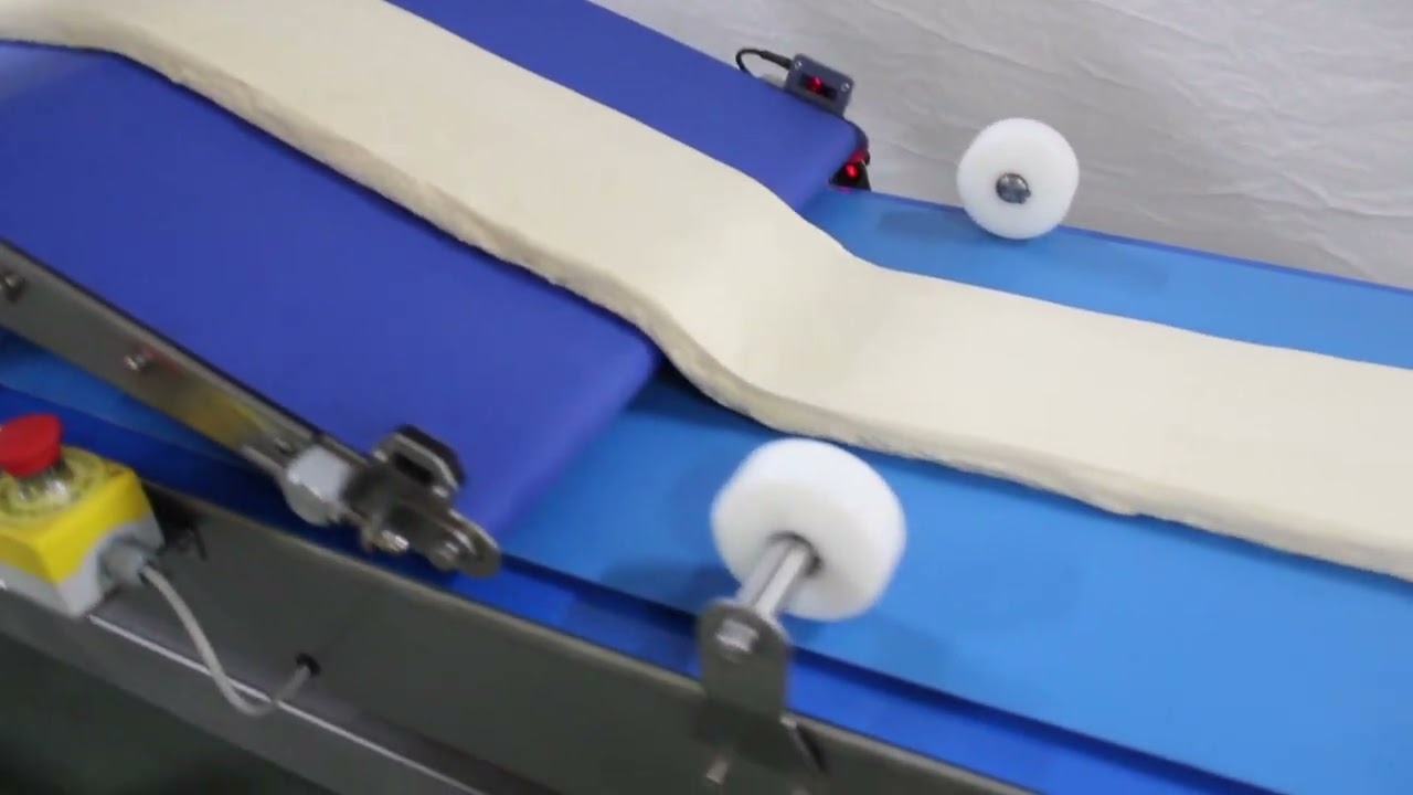 Olivero- Macchina per preparazione della panera e disposizione automatica sulla tela